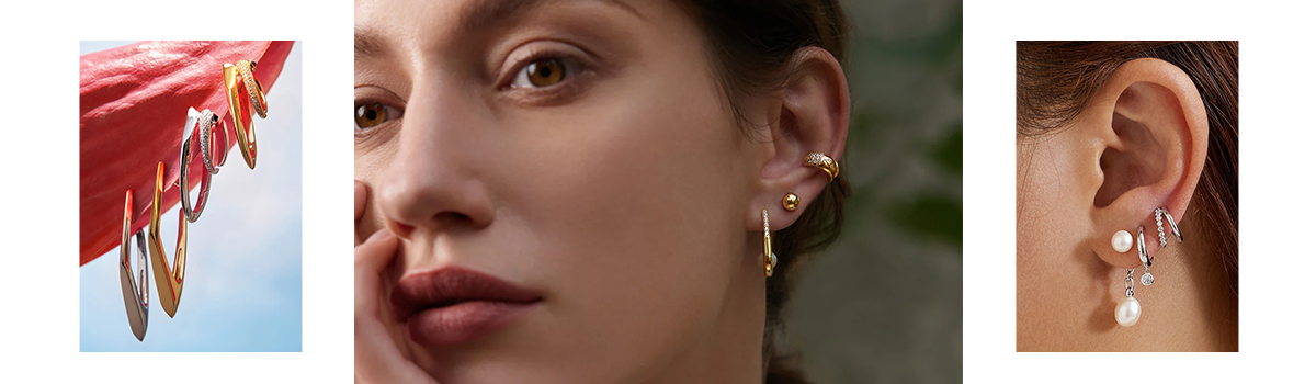 Close up of earring stack featuring clean and modern gold hoop, stud, and sparkly ear cuff.