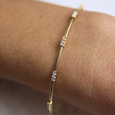 1/5 CTW Diamond Bangle / 14k Gold