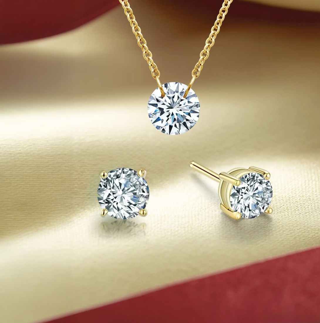 Lafonn simulated diamond jewelry set featuring a round-cut solitaire pendant and matching stud earrings in yellow gold — timeless sparkle with the look of real diamonds at an accessible price point.
