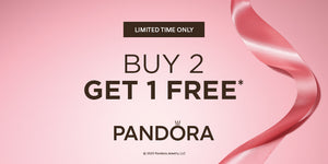 Pandora Jewelry Buy 2 Get 1 Free promotion banner with pink satin ribbon and bold text on a soft pink background — limited time offer on Pandora charms, bracelets, and jewelry.